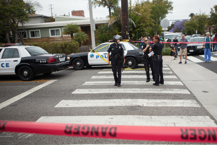 A student waits on the periphery of the Santa Monica College campus on Friday afternoon.