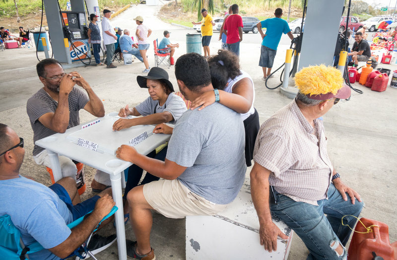 Puerto Rico Hurricane People play dominoes while waiting in line for gas. Limited availability of gas has been a problem across Puerto Rico ever since Hurricane Maria hit last week.