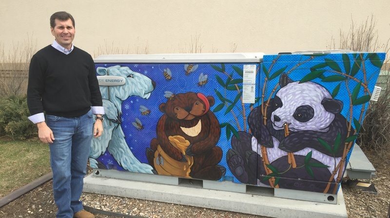 Solar and wind storage Greg Miller, executive vice president of Ice Energy, poses next to the