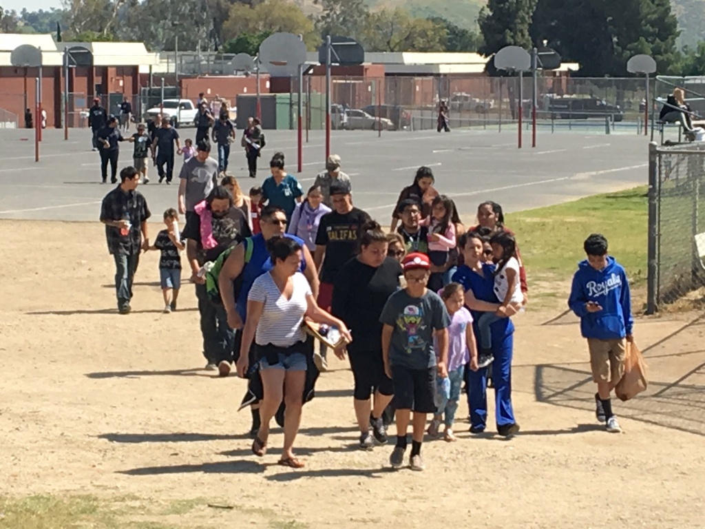 North Park Elementary shooting Reunited families emerged from Cajon High School Monday afternoon following a shooting at North Park Elementary School in San Bernardino that left two adults dead and two students injured.