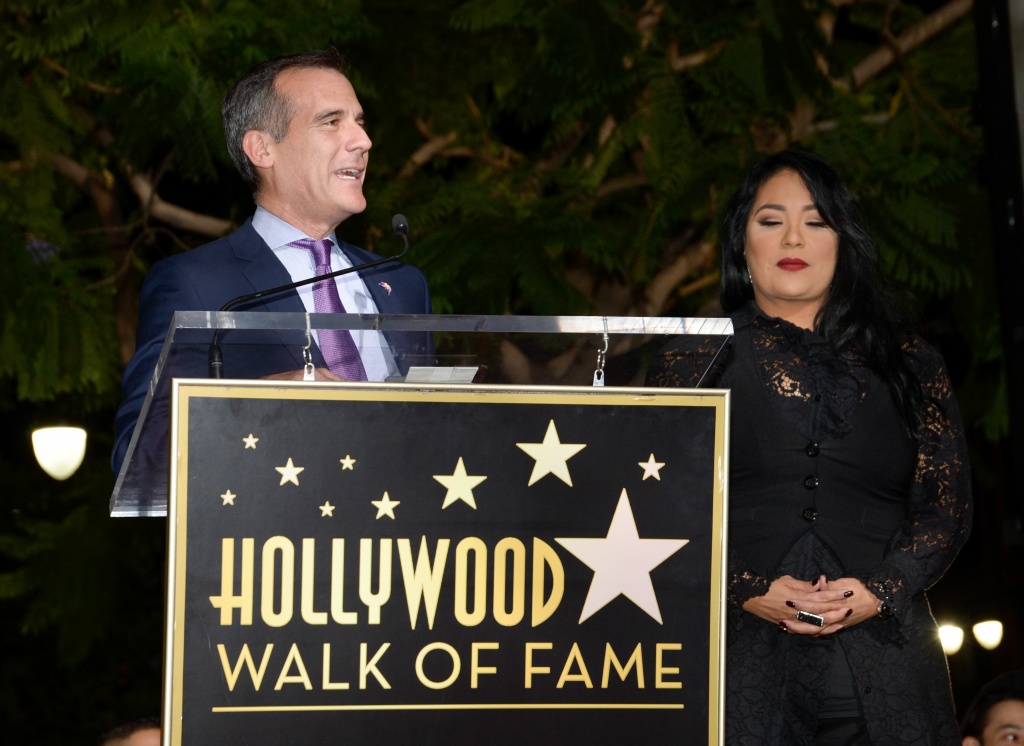 US-ENTERTAINMENT-MUSIC-HWOF-SELENA Los Angeles mayor Eric Garcetti and Suzette Quintanilla speak at the ceremony honoring singer Selena Quintanilla with a star on the Hollywood Walk of Fame on November 3, 2017.