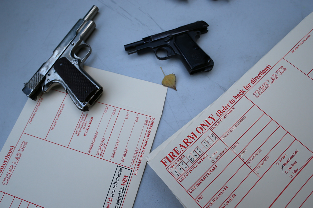 San Francisco Holds Gun Buyback Event Surrendered firearms sit on a table during a gun buyback event on August 8, 2013 in San Francisco, California. Dozens of guns were turned in during a one-day gun buyback event in San Francisco's Mission District put on by San Francisco city officials. In hopes of reducing violence in the area, $100 was given for each working gun that was turned in and $200 was given for assault rifles.