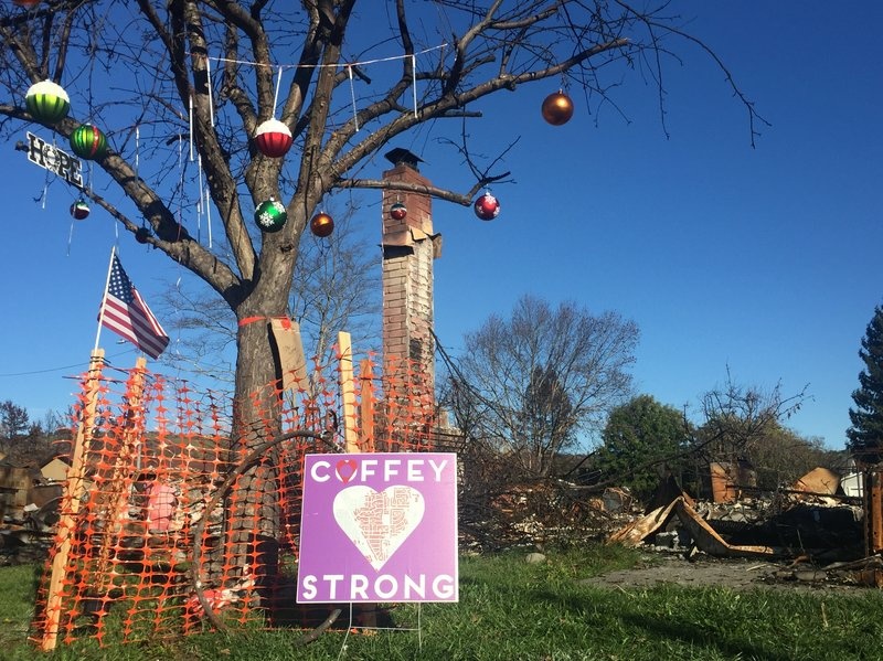 image1_custom-bcb438f02b28b40507e2468450c79593a58e86ad-s800-c85.jpeg The Howe family and neighbors returned to their old neighborhood to put Christmas decorations on one of the few trees left standing after the fire.