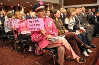 Activists attend the Senate Armed Services Committee hearing on issues associated with a repeal of section 654 of title 10, United States Code, 'Policy Concerning Homosexuality in the Armed Forces', also known as the "Don't Ask, Don't Tell" policy, December 2, 2010 in Washington, DC.