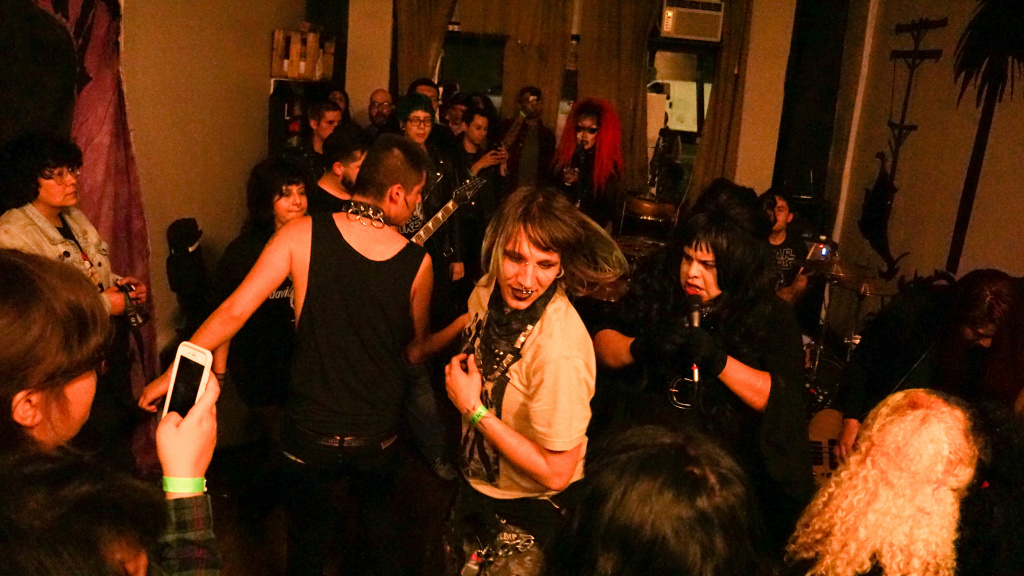 trap girl pit East LA punks dance to South Gate band Trap Girl at La Conxa, 2017.