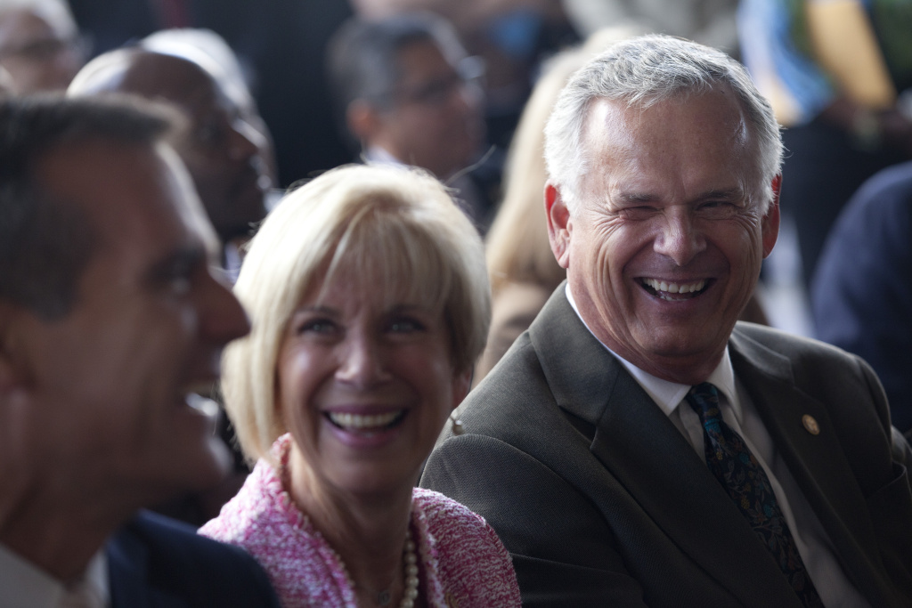 HAHN 003 Mayor Eric Garcetti, left, Congresswoman Janice Hahn and her brother, Superior Court Judge James Hahn joke during the ceremony to name the City Hall East building after justice Hahn, who was the L.A. city controller, city attorney and mayor.