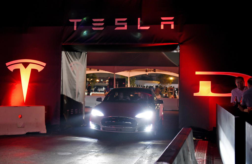 Telsa CEO Elon Musk Unveils New Vehicle HAWTHORNE CA - OCTOBER 09: Tesla owners take a ride in the new Tesla