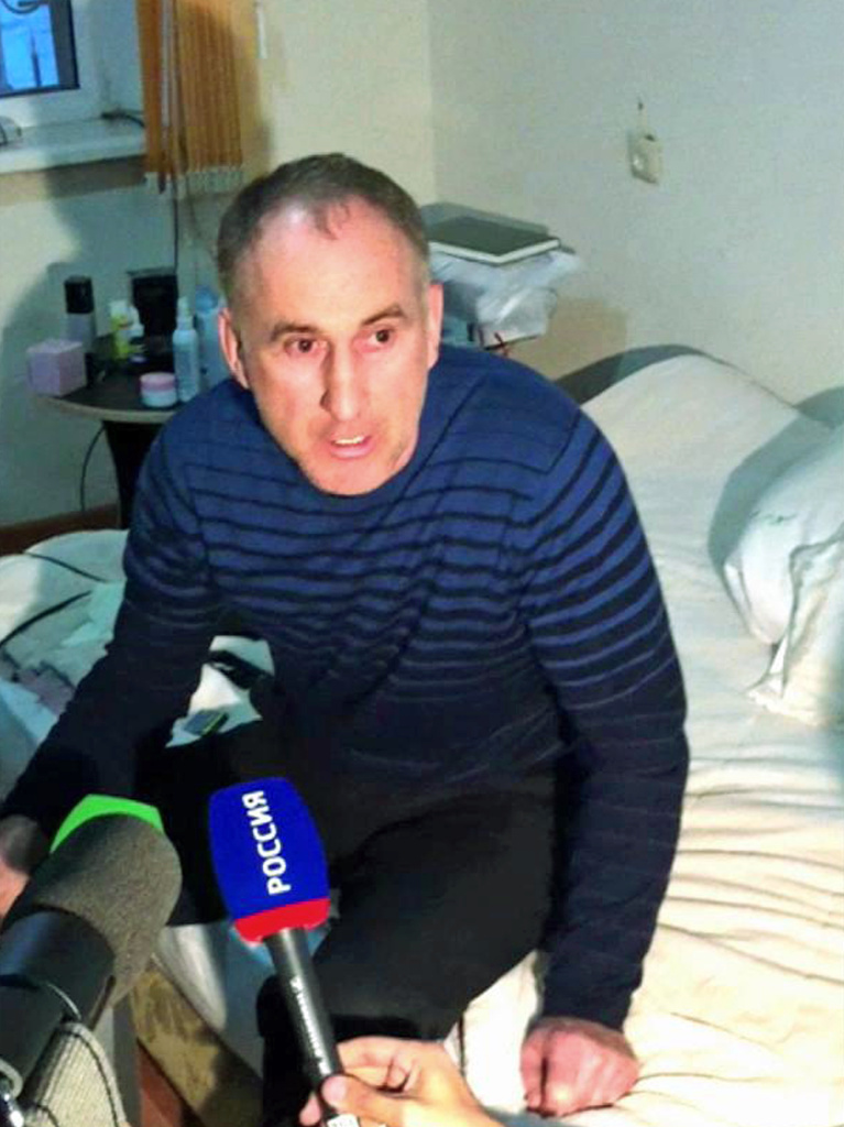 In this image taken from a mobile phone video, the father of Boston bomb suspects, Anzor Tsaraev reacts as he talks to the media about his sons, in his home in the Russian city of Makhachkala on Friday.