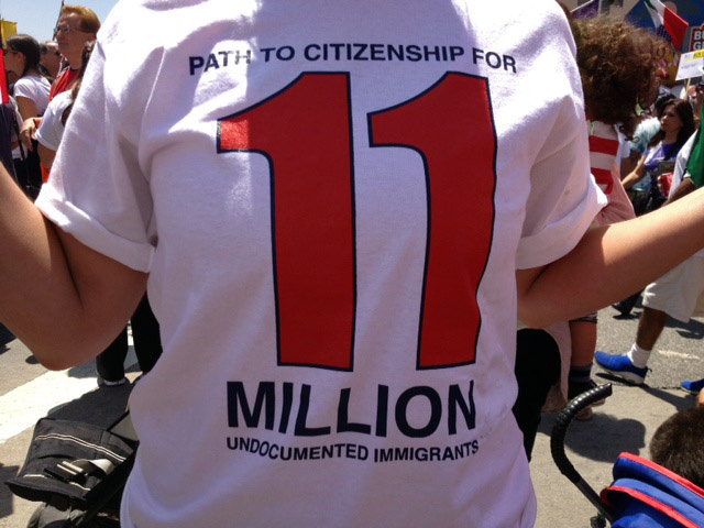 A May Day protester at a Los Angeles immigration rally wears a A May Day protester at a Los Angeles immigration rally wears a