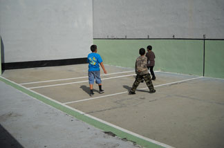 Children play at a handball clinic at the historic Maravilla handball court in East L.A.