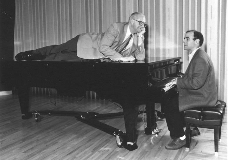 Carl Kasell Kasell decides to take a publicity photo shoot up a notch while Wait Wait... Don't Tell Me! host Peter Sagal tickles the ivories.
