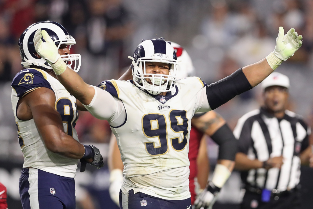 Defensive end Aaron Donald #99 of the Los Angeles Rams reacts after a tackle against the Arizona Cardinals during the second half of the game on December 3, 2017 in Glendale, Arizona. The Rams defeated the Cardinals 32-16.