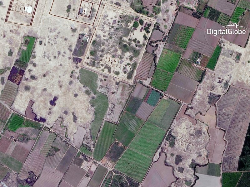 A portion of the site of the pre-Columbian Peruvian city of Chan Chan that shows evidence of heavy looting activity. A portion of the site of the pre-Columbian Peruvian city of Chan Chan that shows evidence of heavy looting activity.