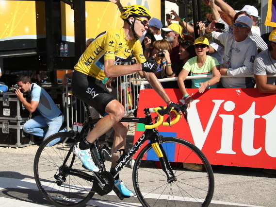 Race leader Chris Froome of Great Britain finishes Stage 20 of the 2013 Tour de France. The penultimate stage of the Tour put Froome ahead by 5 minutes and practically guarantees he finishes Sunday in Paris in the yellow jersey.