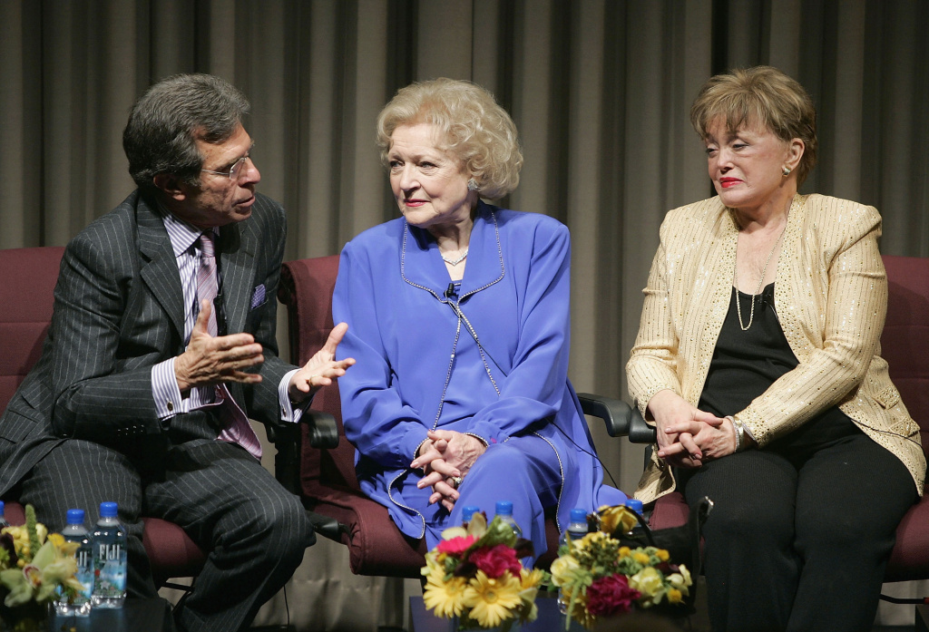 DVD Release Party For Producer Paul Junger Witt talks as actresses Betty White and Rue McClanahan listen during the Q&A for the DVD release party for the first season of