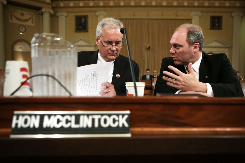 House Ways And Means Committee Holds Hearing On Statutory Debt Limit U.S. Rep. Tom McClintock (R-CA) (L) and Rep. Steve Scalise (R-LA) chat prior to a hearing before the Oversight Subcommittee of the House Ways and Means Committee April 10, 2013 on Capitol Hill in Washington, DC.