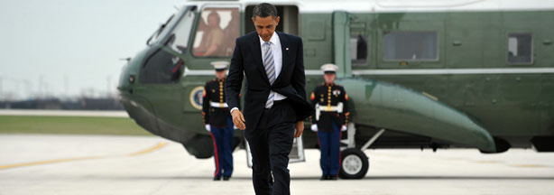 President Barack Obama makes his way to board Air Force One at O'Hare International Airport April 15, 2011 in Chicago. Obama is returing to Washington, DC after attending a series of Democratic Party fundraisers in Chicago.