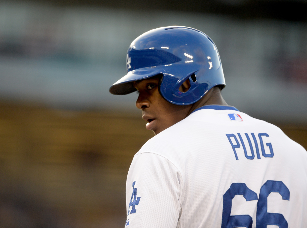 San Diego Padres v Los Angeles Dodgers Yasiel Puig #66 of the Los Angeles Dodgers on first base after his single in his major league debut against the San Diego Padres during the first inning at Dodger Stadium on June 3, 2013 in Los Angeles, California.