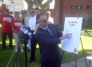 Kurt Owens with the Bell Police Officers Association at a news conference Oct. 28, 2010 displaying an email former city manager Robert Rizzo apparently sent requesting a boost in pay for Lieutenant Ty Henshaw.