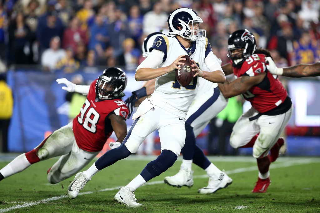 Wild Card Round - Atlanta Falcons v Los Angeles Rams LOS ANGELES, CA - JANUARY 06: Jared Goff #16 of the Los Angeles Rams scrambles during the NFC Wild Card Playoff Game against the Atlanta Falcons at the Los Angeles Coliseum on January 6, 2018 in Los Angeles, California. (Photo by Sean M. Haffey/Getty Images)