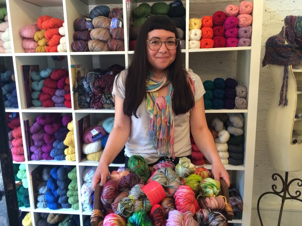 Yarn Crawl J.R. Jaffe holds a basket of yarns she hand-dyed to sell at Abuelita's