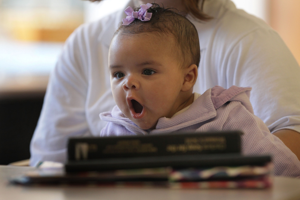 Incarcerated Women Allowed To Keep Newborns In Illinois Pilot Program Three-month-old Alexis sits on her mother's lap in the common area of her ward at the Decatur Correctional Center on February 18, 2011 in Decatur, Illinois.