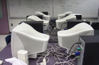 Mercer 20609 Schools and libraries may be the only places many students enjoy access to computers and the Internet. One non-profit's grant-funded program will test whether having computers at home can help students at two Los Angeles middle schools can improve their performance in math.