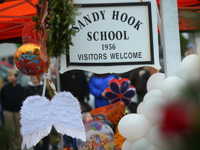 Sandy Hook Elementary School Angel wings and balloons at a makeshift shrine outside Sandy Hook Elementary.