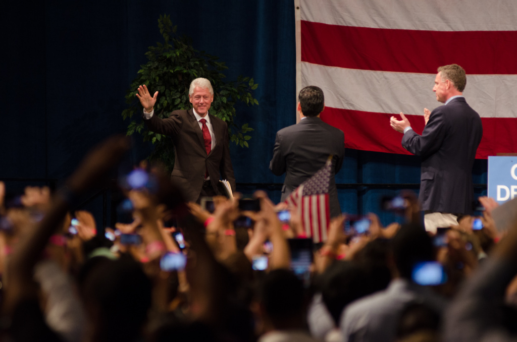 Clinton - 1 Former President Bill Clinton waves at the crowd at a “California’s Voice” event at University of California Irvine in Irvine Calif., Tuesday, October 23, 2012. Clinton endorsed congressional candidates Alan Lowenthal for Long Beach, Mark Takano for Riverside, Scott Peters for San Diego, Raul Ruiz , and Julia Brownley for Ventura at the rally.