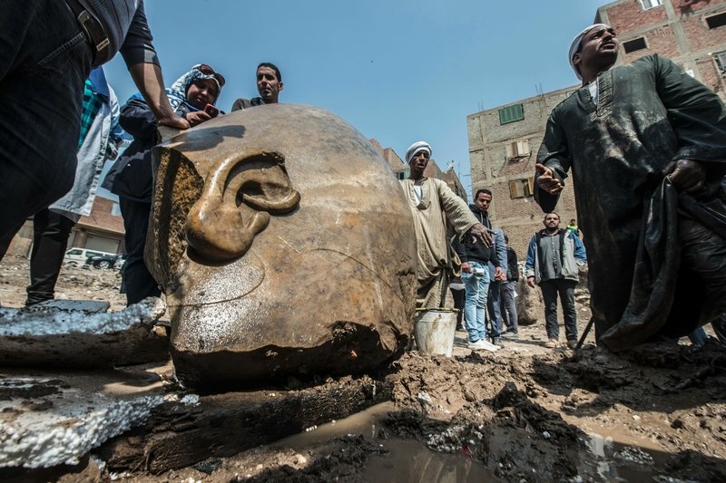 Egyptian workers look at the site of a new discovery by a team of German-Egyptian archaeologists in Cairo's Matariya District on Thursday. Egyptian workers look at the site of a new discovery by a team of German-Egyptian archaeologists in Cairo's Matariya District on Thursday.