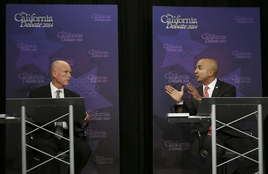 Governor California Debate Gov. Jerry Brown, left, listens as Republican challenger Neel Kashkari speaks during a gubernatorial debate in Sacramento, Calif., Thursday, Sept. 4, 2014. (AP Photo/Rich Pedroncelli, Pool)