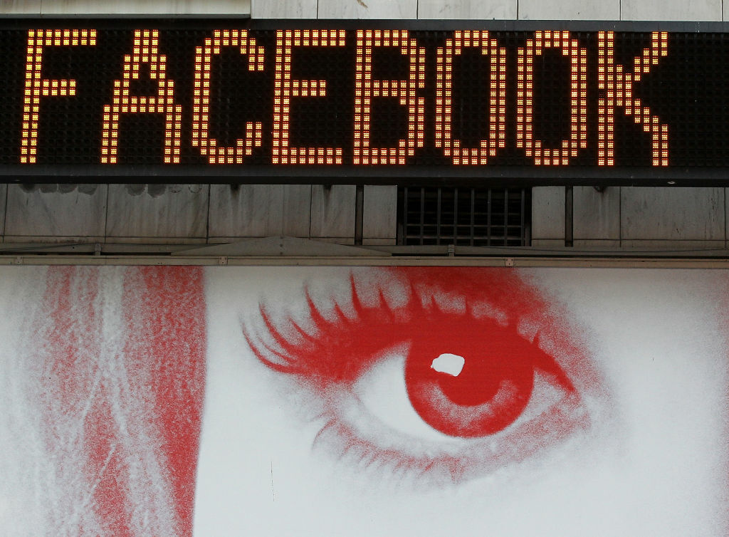 Facebook Sets IPO Price At 38 Dollars A Share A poster is seen below a message board that is announcing Facebook's IPO price in Times Square on May 17, 2012 in New York City. Facebook will list their IPO on Nasdaq on Friday morning with an opening price of $38 per share.
