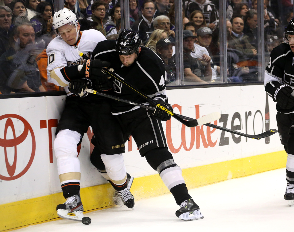 Anaheim Ducks v Los Angeles Kings Corey Perry #10 ofthe Anaheim Ducks and Robyn Regehr #44 of the Los Angeles Kings battle for the puck at Staples Center on April 13, 2013 in Los Angeles, California.