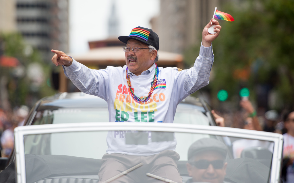 US-LGBT-PRIDE-PARADE San Francisco Mayor Ed Lee waves to a cheering crowd during the San Francisco Pride Parade in San Francisco, California on Sunday, June, 25, 2017.
