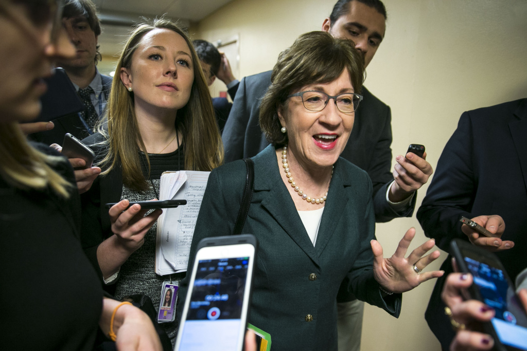 Senate Lawmakers Address The Media After Their Weekly Policy Luncheons U.S. Sen. Susan Collins (R-ME) speaks with reporters as she arrives for the weekly Senate Republican's policy luncheon, on Capitol Hill, December 12, 2017 in Washington, DC.
