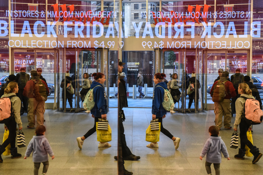 Shoppers Get Early Start To Holiday Shopping On Annual Black Friday People shop at a H&M store on Black Friday on November 24, 2017 in New York City.