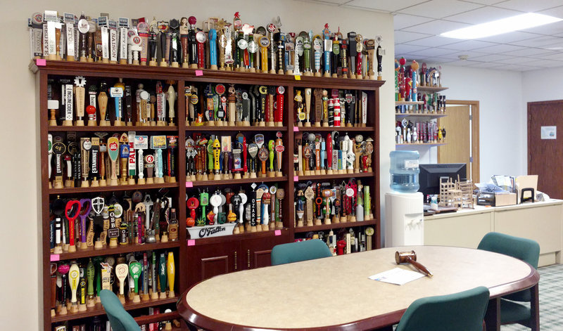 ajs-1_custom-4815443fd6e18b4a1f07c06ed2386222392daea3-s800-c85.jpg Snazzy beer taps on display at the AJS offices.