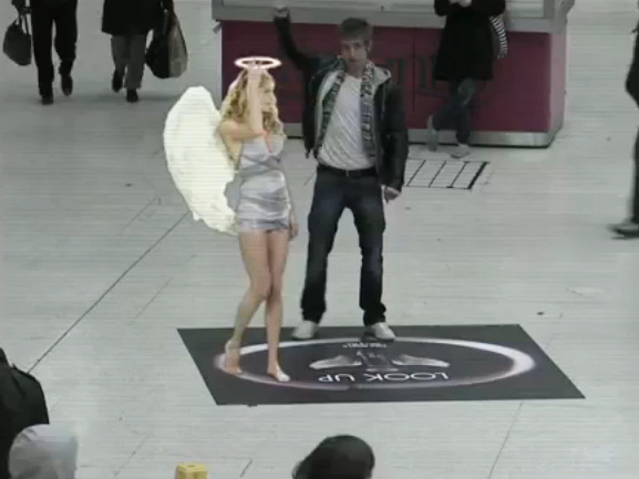 The Lynx angel appears in London's Victoria Station.