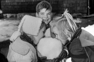 Mercer 12700 Kristen Wheatley (left), Jeff Reichmann and Gale Borden sample a giant snow cone on March 3, 1964 at their school.