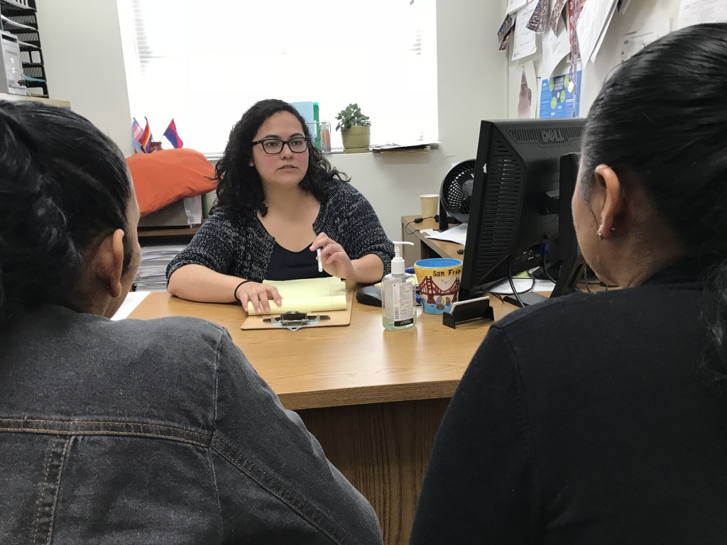 Patricia Ortiz meets with Rosa at the Esperanza Immigrant Rights Project offices in Los Angeles to discuss her asylum case, Dec. 5, 2018.