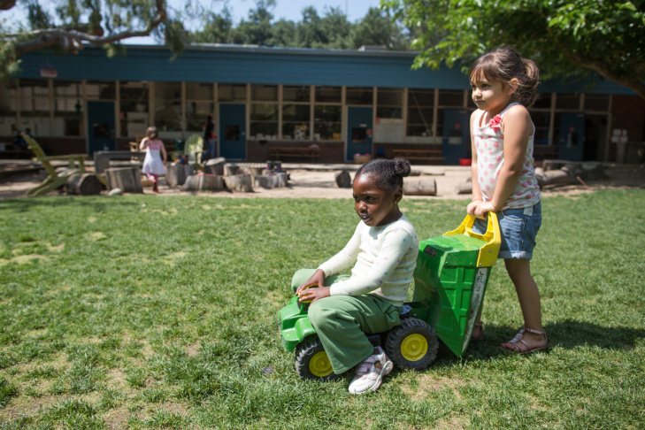 A preschool student at La Canada's Child Educational Center plays with mud. Jordan Young, a neuroscientist,  emphasizes that associations between gender and color, or gender and specific activities aren’t hardwired in the baby’s brain – the physical and social environment we give to kids builds them up