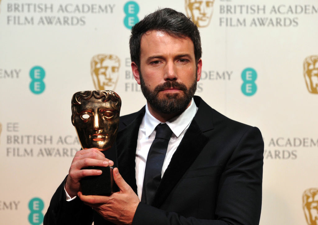 BRITAIN-ENTERTAINMENT-FILM-AWARDS-BAFTA US actor and director Ben Affleck poses with Best Director award for his film Argo during the annual BAFTA British Academy Film Awards at the Royal Opera House in London on February 10, 2013.