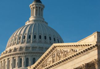 The sun rises on the US Capitol Dome on the US Senate side early December 24, 2009, in Washington, DC. File photo.