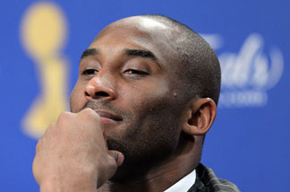 Kobe Bryant #24 of the Los Angeles Lakers answers questions after the Lakers defeated the Boston Celtics 89-67 in Game Six of the 2010 NBA Finals at Staples Center on June 15, 2010 in Los Angeles, California.