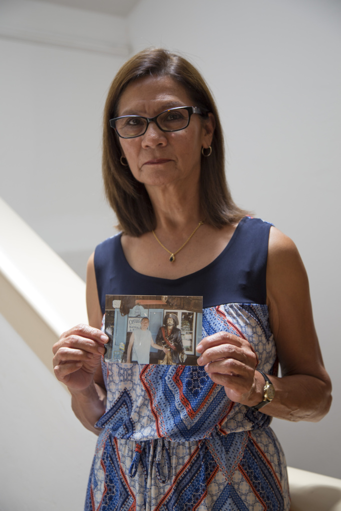 Jail suicides Lydia Nunez holds a photo of her son Ruben.