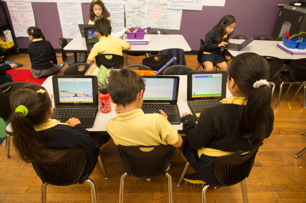 iPads in Schools Komienza Community Prep in Huntington Park rotates Chromebooks and iPads between groups of students so everyone gets a turn.