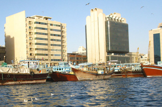 Wooden boats known as dhows are used in trade between Dubai and Iran. The emirate has long been an economic lifeline for Iran, despite U.N., U.S. and EU sanctions against Tehran's nuclear program. But new financial restrictions imposed on Dubai by the United Arab Emirates' capital, Abu Dhabi, have made Iran-Dubai trade more difficult.