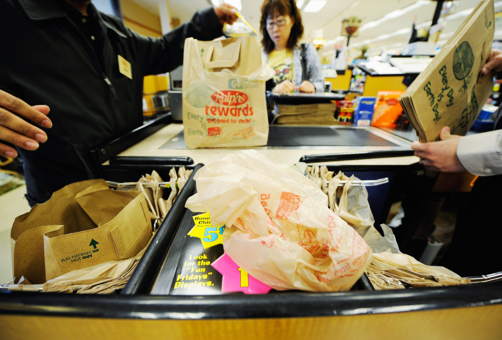 Plastic bag ban Customers of Ralphs supermarket use plastic bags to carry their groceries home on October 25, 2011 in Glendale, California.