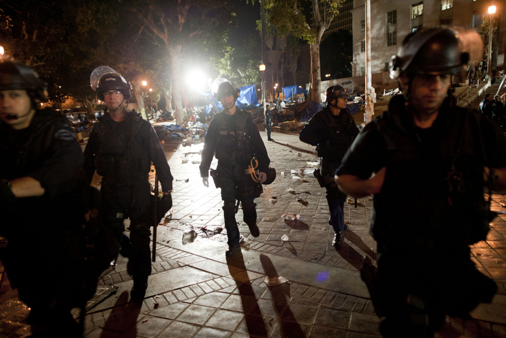 Los Angeles Police Move In To Evict Occupy LA Encampment Members of the Los Angeles Police Department patrol the park in front of City Hall in downtown in the early hours of November 30, 2011 in Los Angeles, California. Protesters remained on the City Hall lawn despite a deadline, set by Los Angeles Mayor Antonio Villaraigosa, to dismantle their campsite and leave the park which the city declared closed as of 12:01 am November 28th.