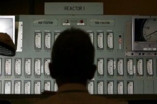 A power station worker monitors one of the reactors in the control room of England's Oldbury Nuclear Power Station in 2006.